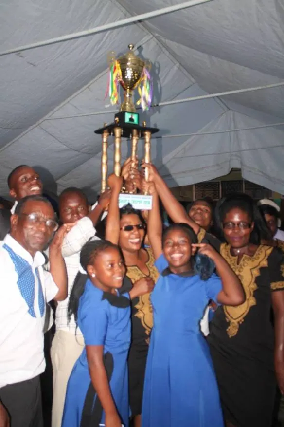 Holy Trinity Cathedral Choir lifting the Bishop's Trophy in jubilation.jpg