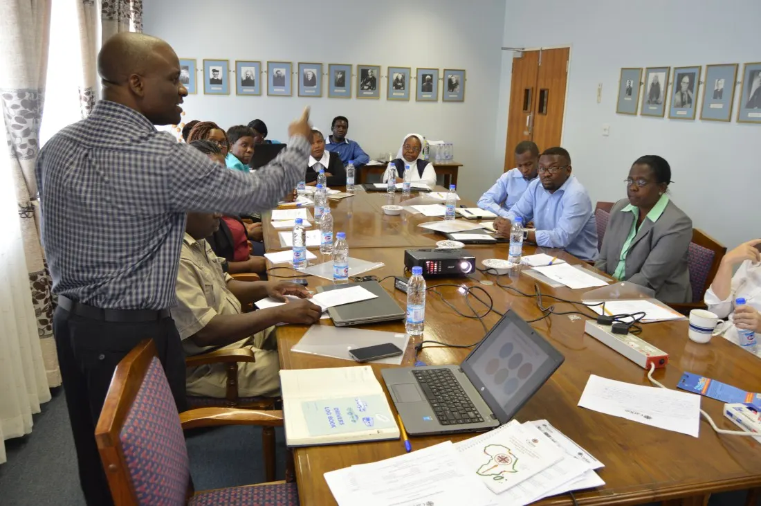 Caritas Coordinator, Chris Mwembe making a point..JPG