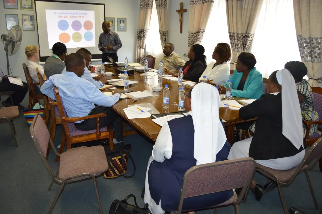 Caritas Coordinators during a workshop to review their work.
