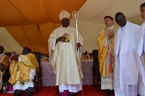 Bishop Mupandasekwa after his ordination stands between the Papal Nuncio to Zimbabwe, Archbishop Marek Zalewski (right and Archbishop Robert Ndlovu (left).JPG