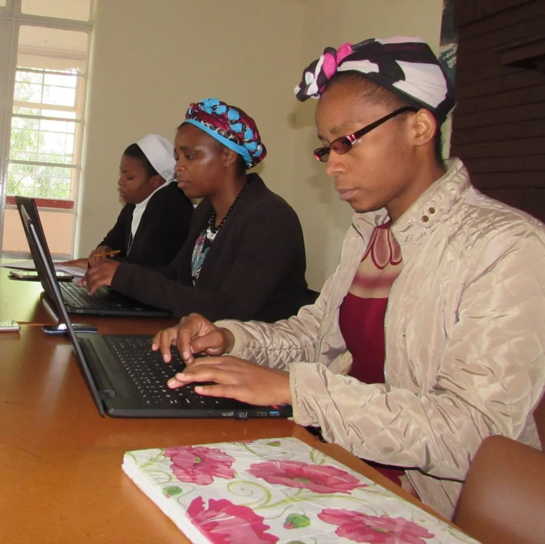 Serious business as some students of the formation programme take notes from a lecture by Fr. Mark Chikuni CSsR..jpg