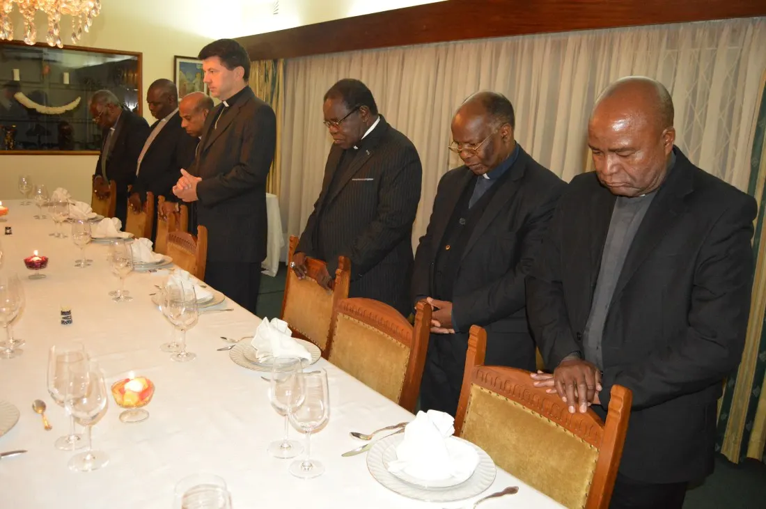 Archbishop Zalewski flanked by Bishop Michael Bhasera and other Bishops.JPG
