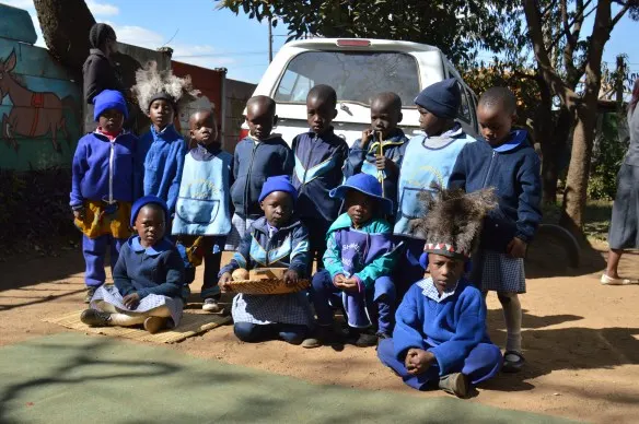 Nenyere Day Care Centre Drammar Group pose for a photo.