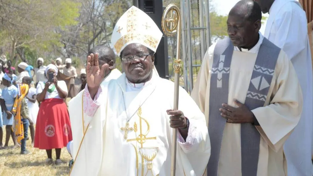 Bishop Michael Bhasera leaves the stage after ordination.