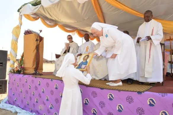 Superior General of the SOLS, Mother Carla Bertani presents a gift to Sr. Luisa in appreciation of her leadership role in Zimbabwe..JPG
