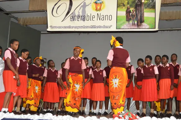 Nagle House school chlidren entertaining guests.