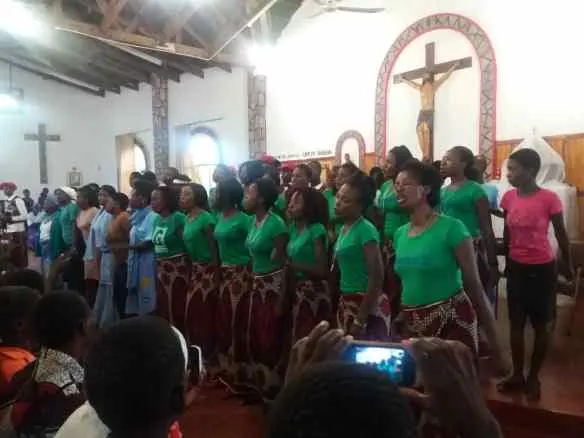 Members of St. Fidelis choir doing what they know best at St. John's Makwa where they had come for an exchange musical programme.