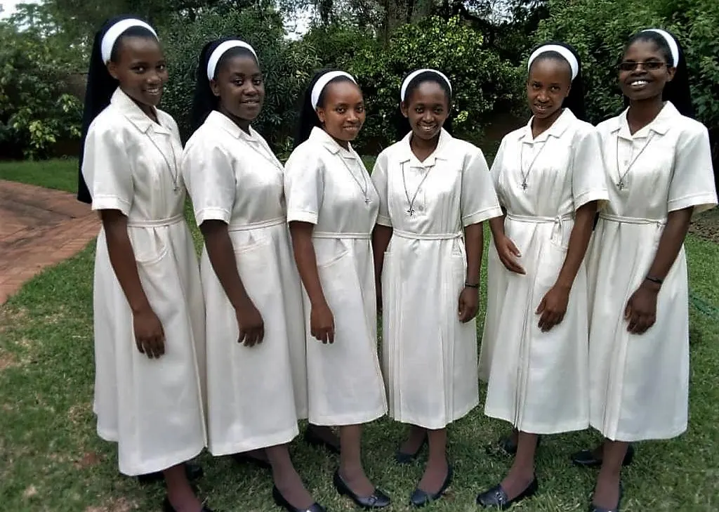 From left to right Srs. Carolyne, Muoka Mumo, Constance Gwamure, Margaret Wangeci Wamburu, Clara Mutuma, Caroline Nelius kuria and Silen Monica Kabwe after their first profession in Lusa