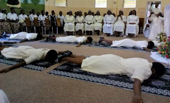 The six newly professed lie prostate soon after gospel reading before pronouncing their vows. (2)