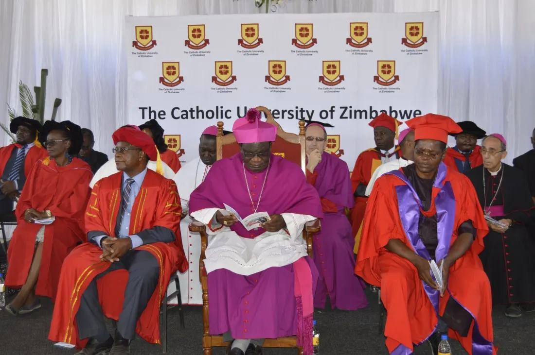 Archbishop Ndlovu flanked by the Vice Chancellor of the Catholic University, Professor Ranga Zinemba and the University's Registrar, Br. Albert Mada.