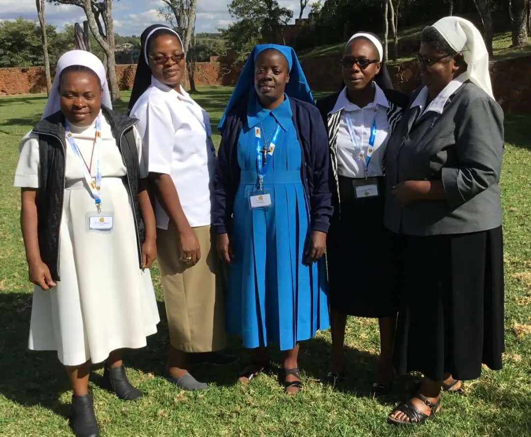 Some sisters at the Sister to Sister Conference take time to build new relationships.