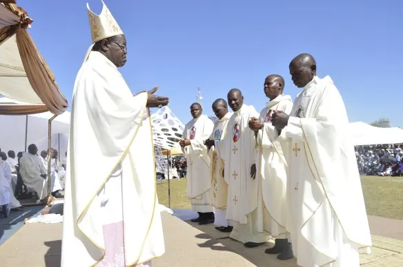 Bishop Bhasera welcomes the newly ordained priest into the clergy.